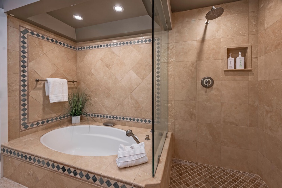 Soaking tub and shower (bathroom for bedroom 2)