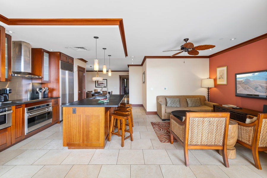 An open floor plan for visiting between the kitchen and dining area.