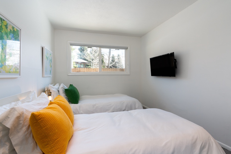 Guest bedroom two is ideal for kids with two doubles as well