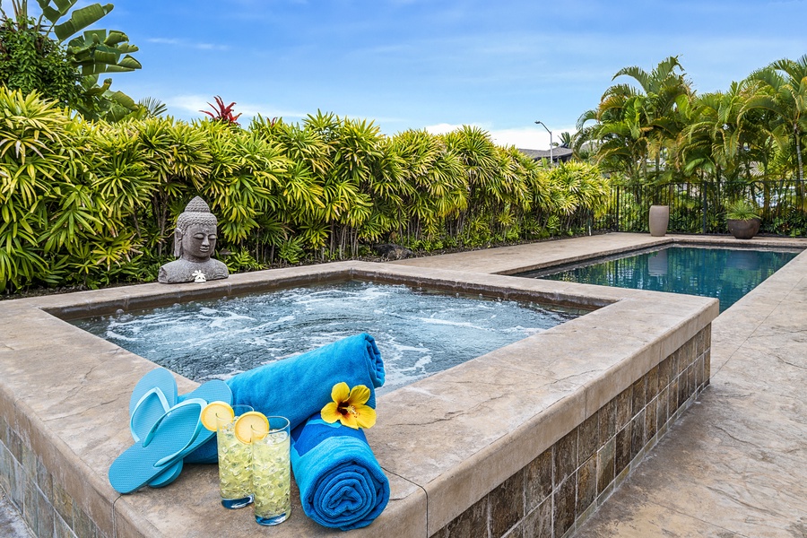 Soak under the stars in the bubbling spa—perfect for relaxation after Kona adventures.