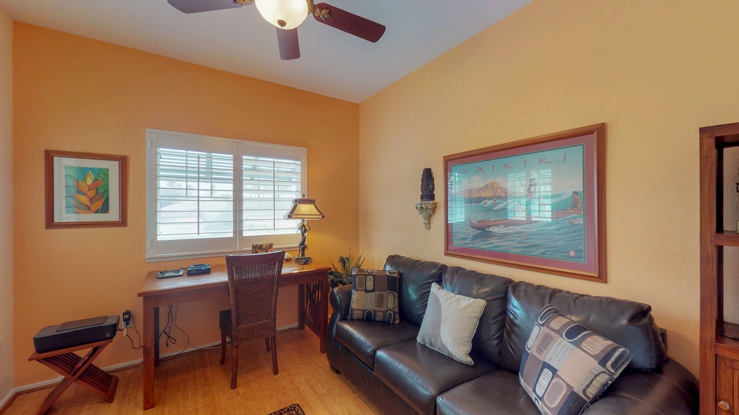 The upstairs den has desk and sofa bed.