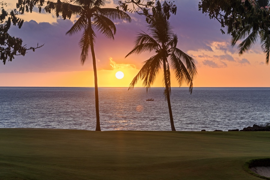 The sun drops into the Pacific behind the palms, the reason evenings run late here.