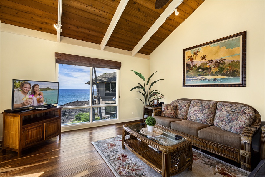 Open sight lines and vaulted ceilings make this living room!