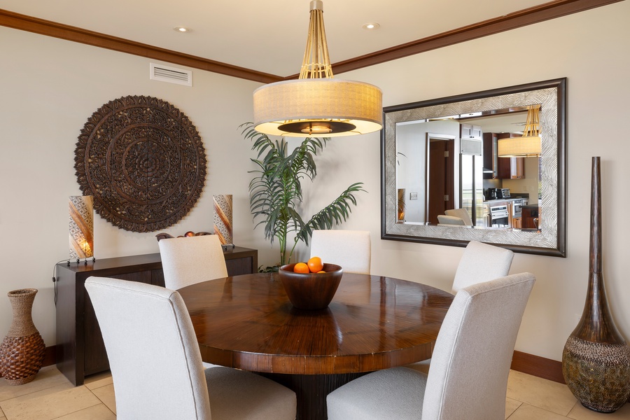 Elegant dining space with warm lighting and coastal touches.