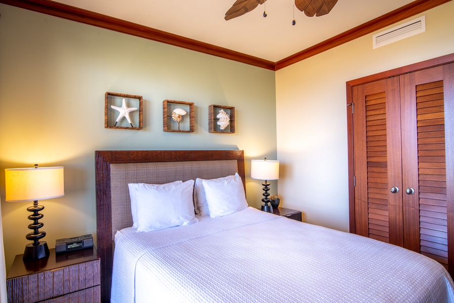 The second guest bedroom with comfortable and stylish surroundings.