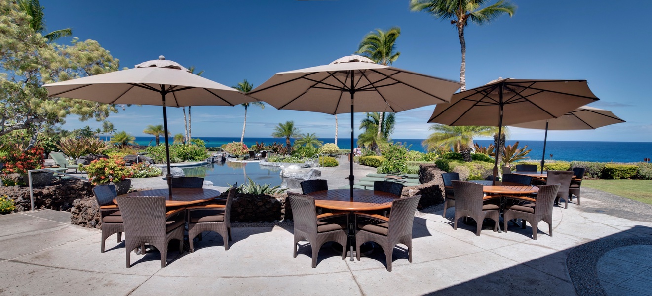 Al fresco dining by the pool and ocean at Hali'i Kai Resort's private Ocean Club Bar & Grille