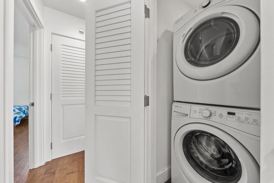 Laundry area with a washer/dryer.