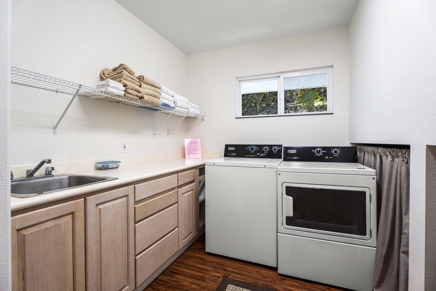Laundry room equipped with commercial grade washer/dryer