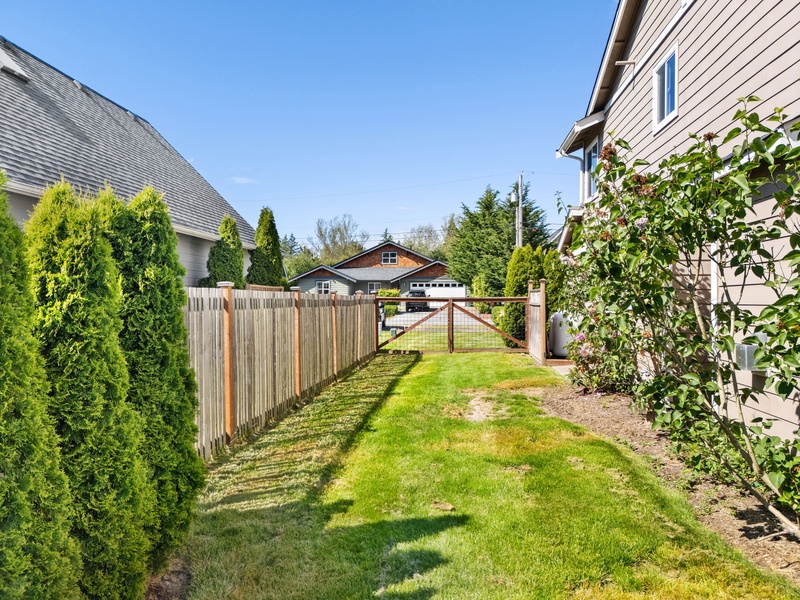 The property sits in a peaceful residential area with well-maintained neighboring homes and manicured landscaping, offering a quiet retreat setting.