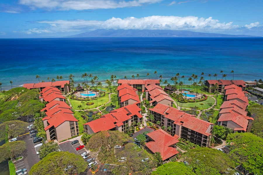 Papakea K-105 sits oceanfront with sweeping views and two pools nestled among lush tropical grounds.