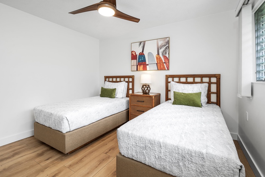 Guest bedroom with twin beds that can convert to a king—great flexibility for families or friends.