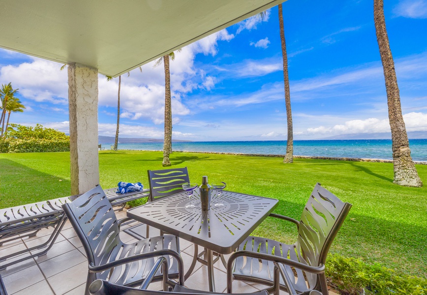 Enjoy oceanfront dining and island views from the lanai at Papakea Resort L-106, pure paradise