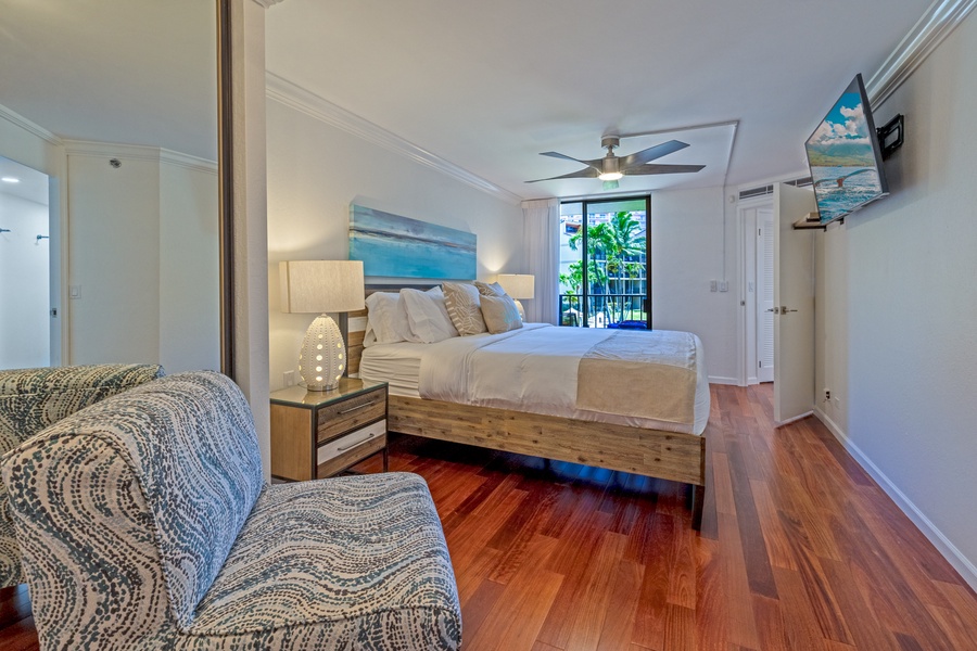 Rest in the king bed at Kaanapali Shores 213, with private lanai access and tranquil vibes.