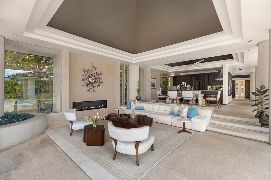 Plush sectional sofas adorned with elegance in the living area.
