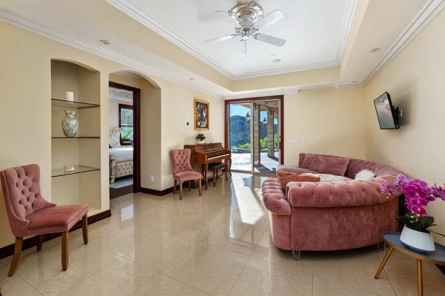 A pair of plush sofas anchors a space perfect for conversation, relaxation, and time together.