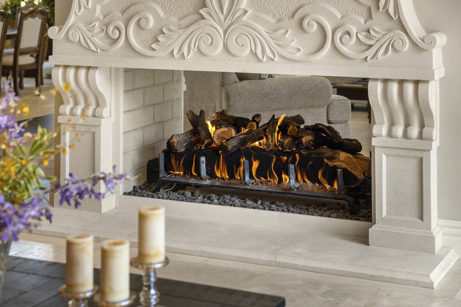 Stunning fireplace with intricate stonework, creating a cozy and elegant focal point.