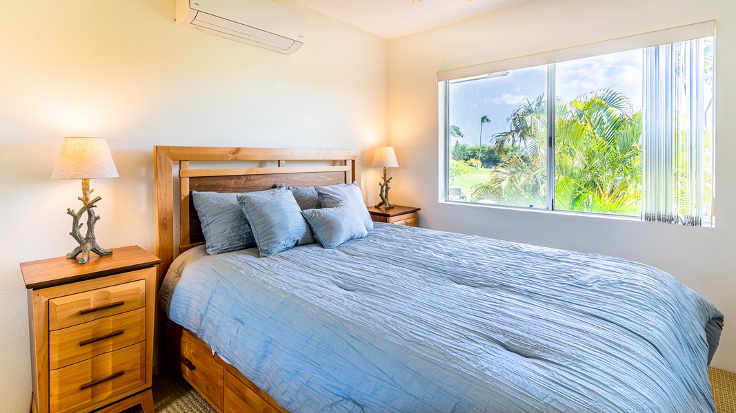 The second guest bedroom with soft and luxurious bedding.