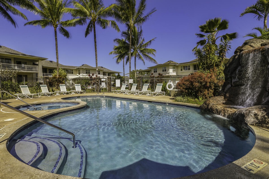 Take a refreshing dip in the lagoon-style pool surrounded by palms.