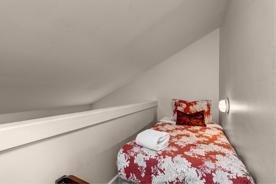 Single bed in upstairs area (no door)