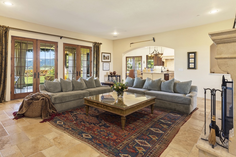 The family room is the heart of the home, centered between the kitchen, living and dining rooms.