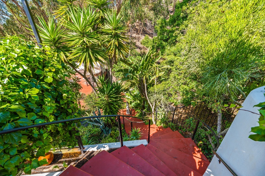 Ascend into your vacation retreat via these inviting staircase steps.