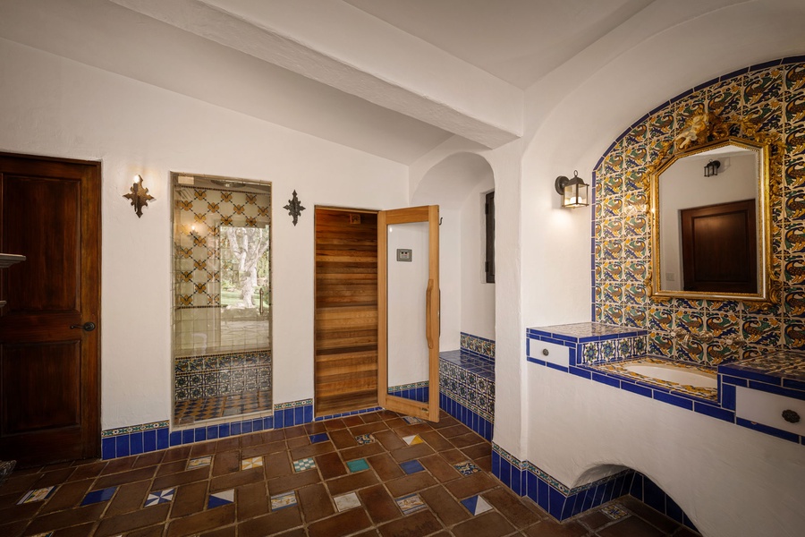 Your private bathroom sanctuary adorned with stunning handcrafted tiles and rustic charm that invites relaxation.