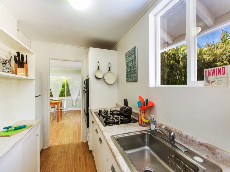 The guest cottage features a full kitchen, perfect for home-cooked meals.