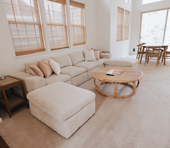 Comfortable sectional invites movie nights, naps, or quiet mornings with coffee and mountain views.