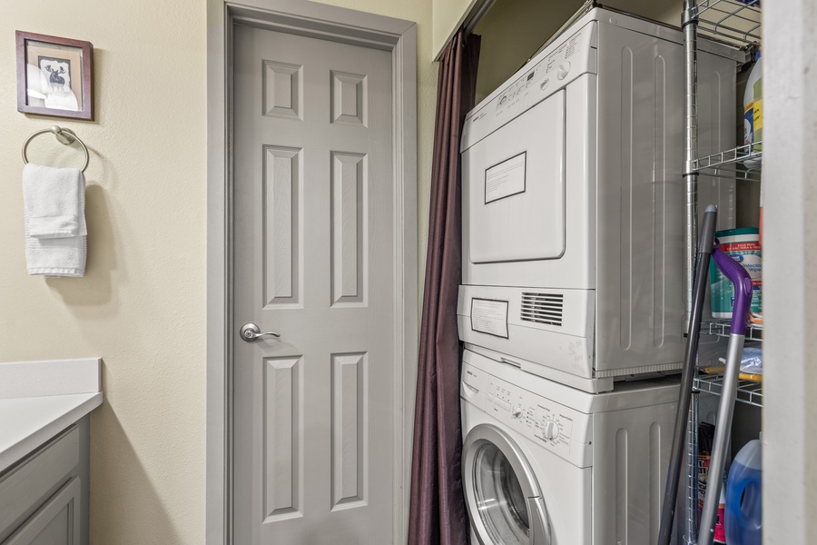 Laundry area with a washer/dryer.