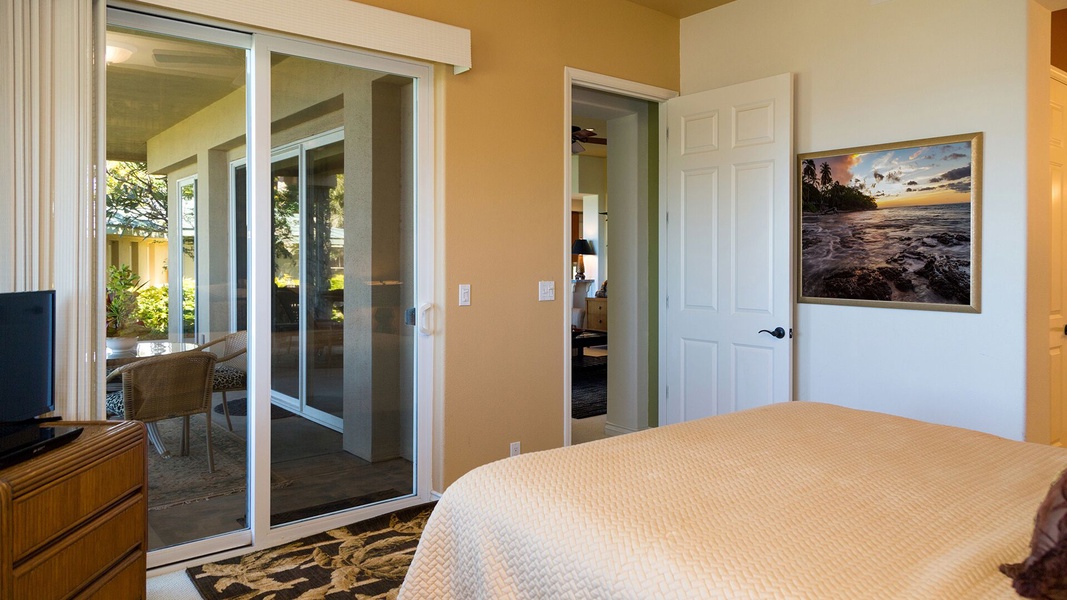 The Primary Bedroom has it's own private entrance to the lanai.