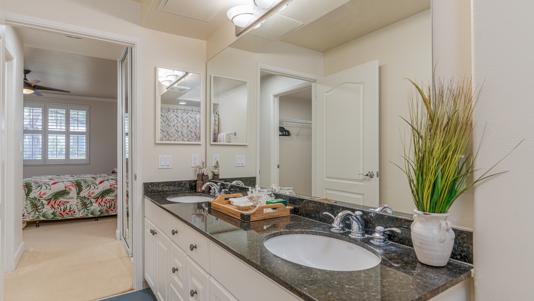 The spacious primary guest bathroom.