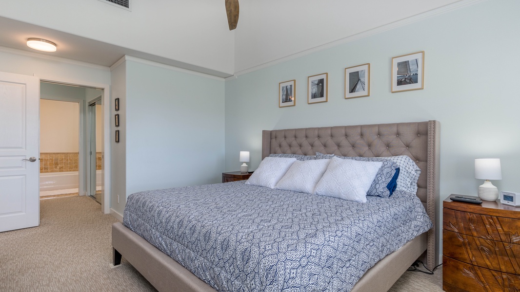 Wake up refreshed to views of island skies in the primary guest bedroom.