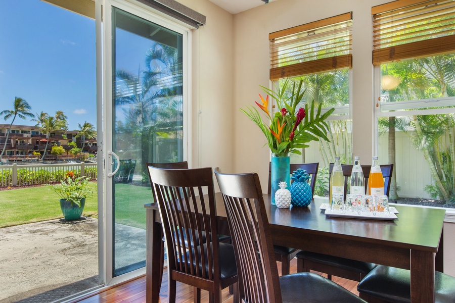 Gaze across the expansive dining area, seamlessly connecting to the kitchen and inviting living space.