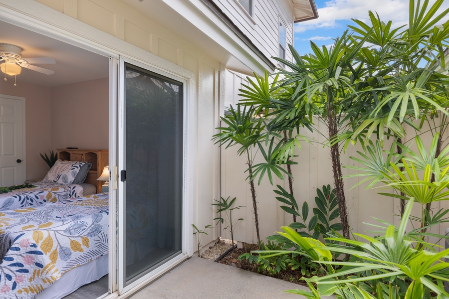 Direct patio access from the second bedroom connects you to the island breeze and fresh air.