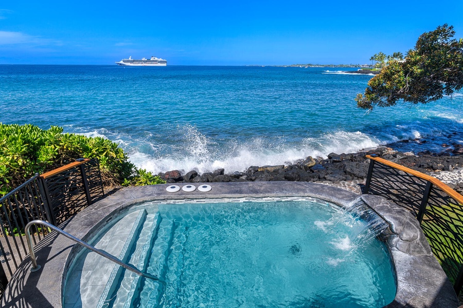 Soak in the spa as waves crash against the lava rock shoreline below.
