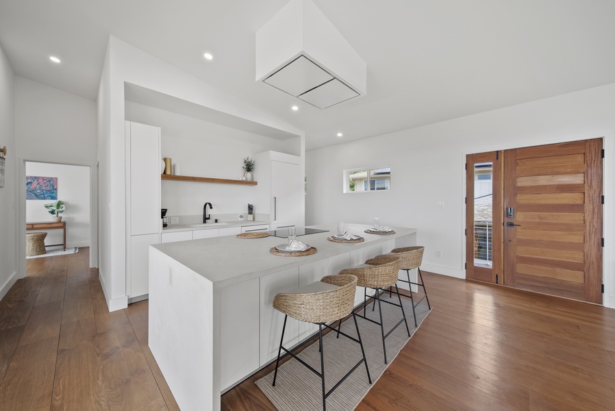 Island bar for quick meals and lively conversations, ideal for entertaining guests.