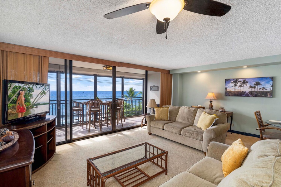 The wall to wall windows to the lanai provide the perfect backdrop.