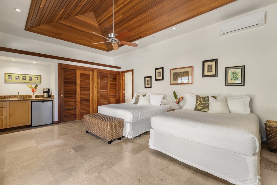 Guest House has separate courtyard entrance and is furnished with 2 Queen Beds, Wet-Bar, Smart TV, and Pool Access