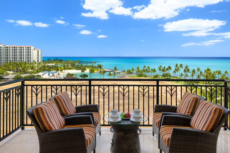 Wake up to turquoise waters and swaying palms from your private oceanfront balcony, where morning coffee tastes better with paradise as your backdrop.