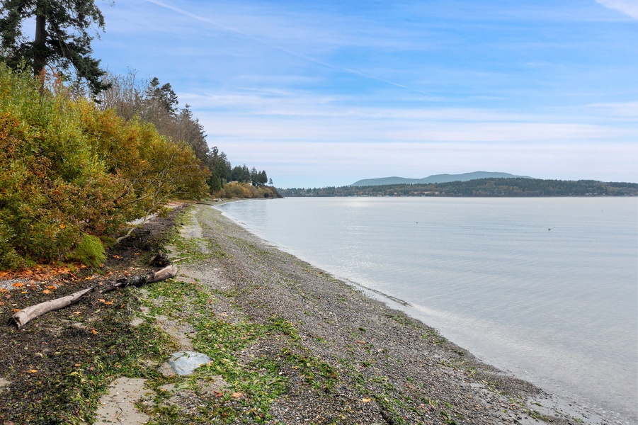 Wander down to your private tidal beach—perfect for peaceful strolls, beachcombing, or watching the tide roll in.