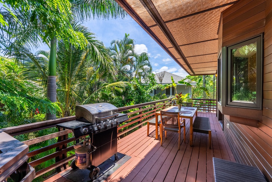 The wrap-around decks provide ample space for outdoor dining and relaxation, with a gas grill for barbecues.