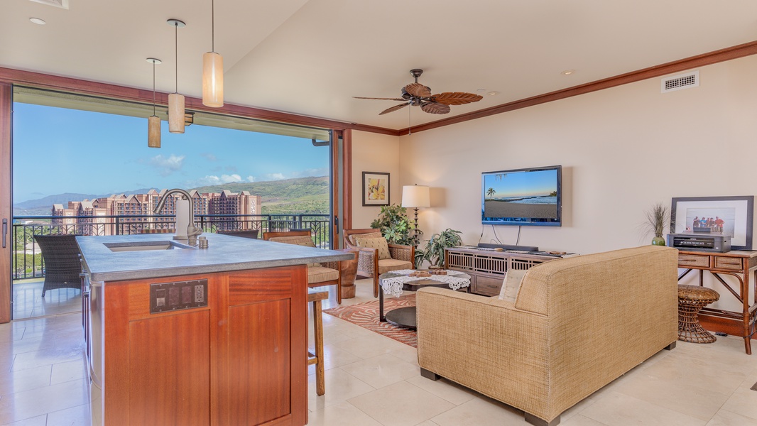 Lounge in luxury in the living room with ocean views and a large-screen HDTV—perfect for movie nights after a beach day.