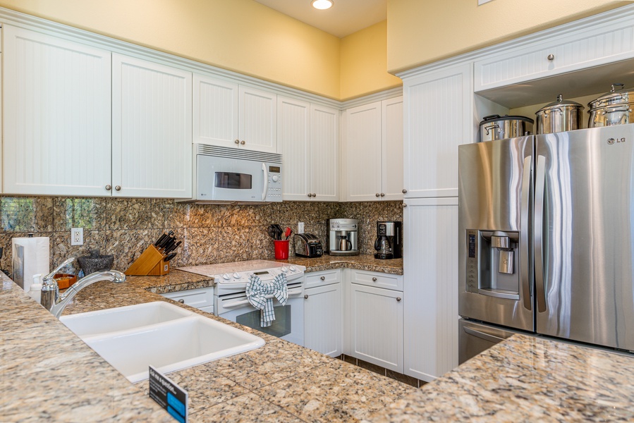 The kitchen is equipped with numerous amenities for your culinary adventures.