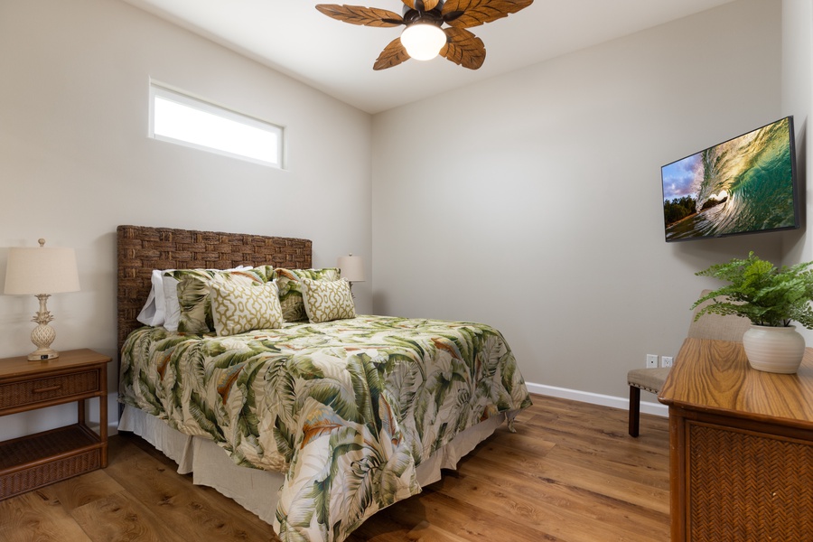 The queen guest bedroom is very spacious and has a smart tv