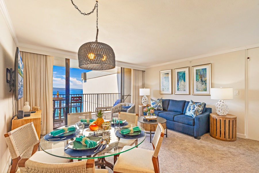 Lounge and dine comfortably in Kaanapali Shores 903’s open living space leading to the lanai.