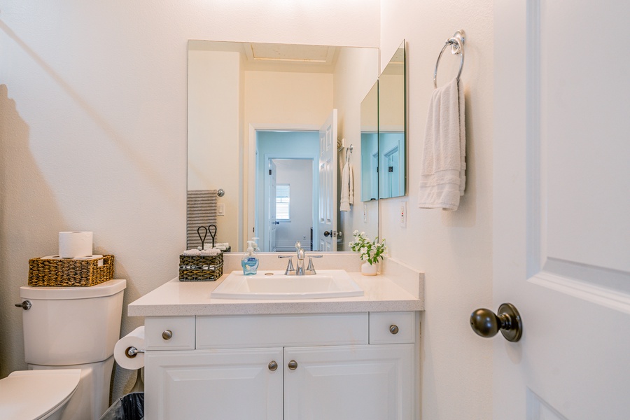 The powder room with a single sink.