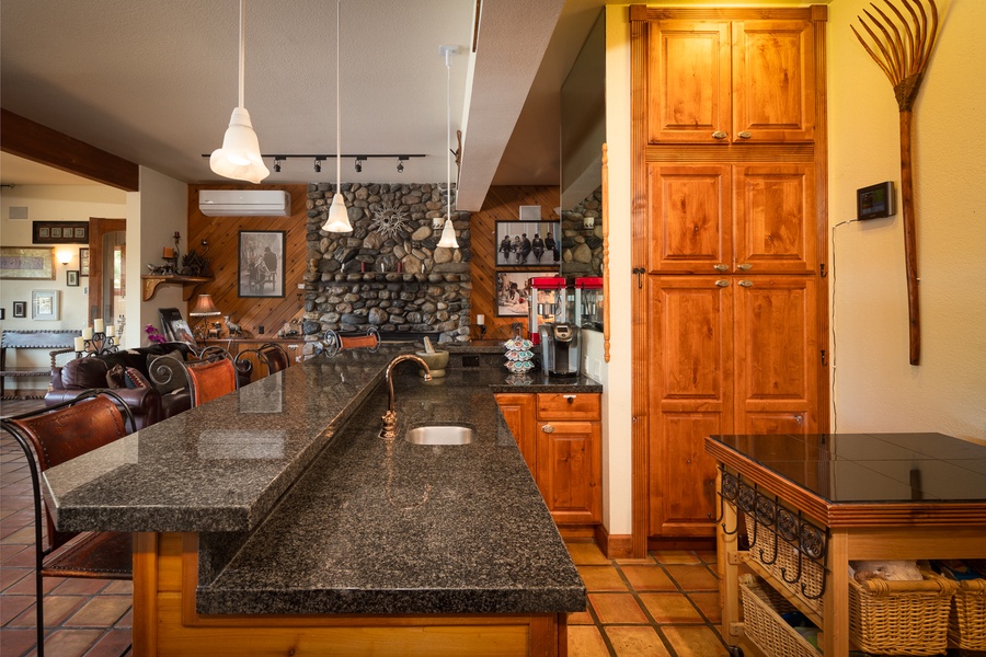 Kitchen island - a perfect spot for entertainment while crafting delightful meals.