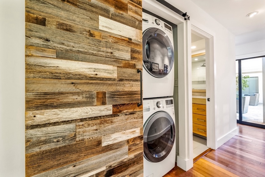 In-home laundry with full-size washer and dryer.