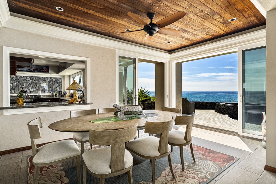 Indoor dining with views over the infinity edge into the ocean!