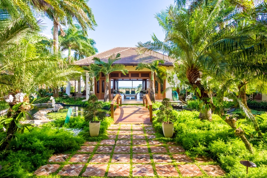 Relax in the open-air lounge with stunning garden and ocean views.